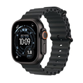 Apple Watch Ultra 3 titanium case shown in rugged outdoor use, emphasizing durability.