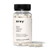 Arey Not Today bottle with daily hair supplement capsules for hair vitality.