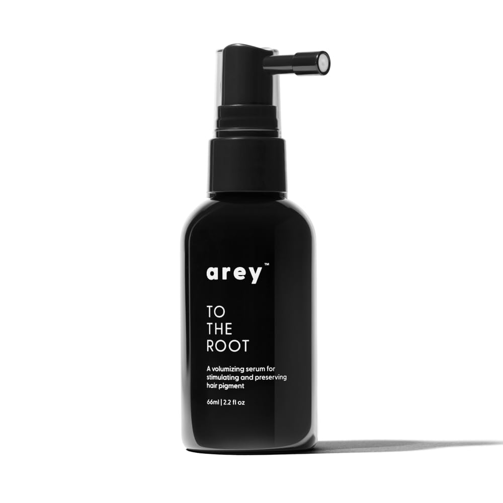 Arey To The Root serum bottle on a clean surface for daily scalp care