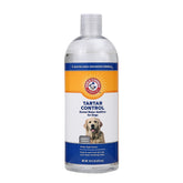 Arm & Hammer Clinical Care Dental Rinse bottle in dog bowl for daily oral support.