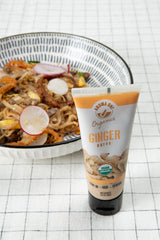Squeeze-action shot of Aroma One ginger paste for quick weeknight meals.