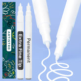 ARTISTRO 2 white permanent marker cap closeup showing precision