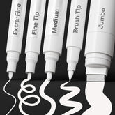 ARTISTRO 5 white paint pen on rock for opaque, durable designs.