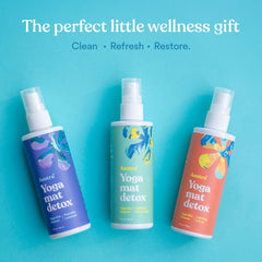 ASUTRA Yoga Mat Cleaner label close-up highlights essential oils and purity