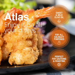 Atlas olive oil glass bottle on counter ready for cooking.