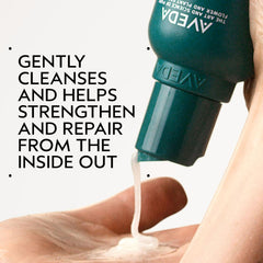 AVEDA Botanical Repair conditioner bottle highlighting bond-building for smoother hair