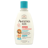 Aveeno Kids Coily Hair Conditioner bottle promotes detangling and moisturized curls.