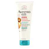 Aveeno Kids Coily Leave-In Conditioner bottle pour enables quick detangling and smooth curls.