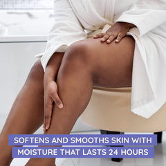 Applying Aveeno lavender scented lotion to relax and hydrate skin.