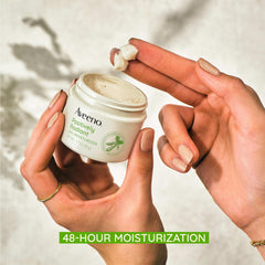 Aveeno Positively Radiant hyaluronic acid close-up emphasizes lasting moisture.