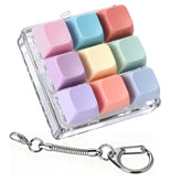 Axlksia keyboard fidget keychain press for focused work and stress relief.