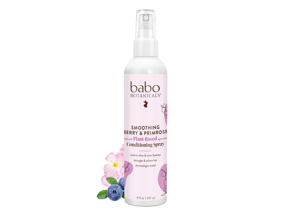 Babo Botanicals smoothing berry conditioning spray bottle for gentle detangling and frizz control.