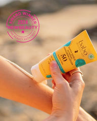 Babo Botanicals sunscreen lotion texture shows lightweight, non-greasy application ideal for sensitive skin.