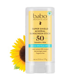 Babo Botanicals Super Shield SPF50 Stick applied to the face for fast mineral protection.