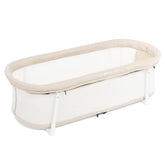 Baby Delight Snuggle Nest Bassinet with fold-out legs for quick, secure setup.