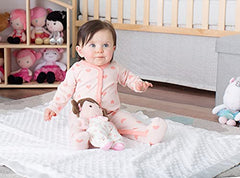 Baby Starters plush doll with rattle offers gentle entertainment.