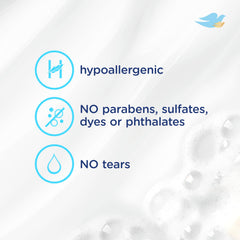 Baby smiling during bath with Baby Dove hydrating wash