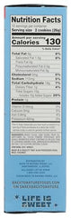 Back to Nature Classic Creme Cookies dunked in milk for pairing.
