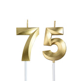 Bailym gold 75th birthday candle topper adds milestone sparkle on cake.