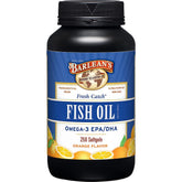 Barlean's Omega-3 orange bottle on kitchen counter for daily heart and brain support.