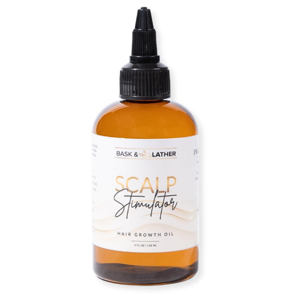 Bask & Lather scalp stimulator bottle for easy application and scalp nourishment.