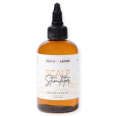 Bask & Lather scalp stimulator bottle for easy application and scalp nourishment.