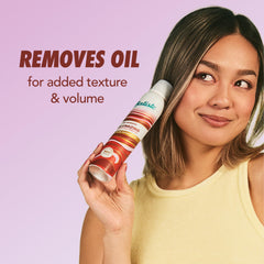 Batiste Volumizing Dry Shampoo absorbs oil at roots to revive dull hair