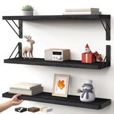 BAYKA wall-mounted floating shelf trio in black for books and decor in a compact space