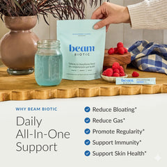 Measuring scoop beside powder illustrating easy daily dosing for gut health support.