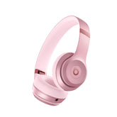 Beats Solo 4 metallic pink on-ear headphones with immersive sound for daily listening.