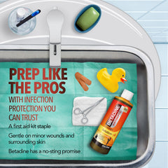 Betadine antiseptic 10% povidone-iodine golden-brown color shows application coverage.