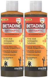 Betadine antiseptic solution bottle pouring for quick wound cleaning.