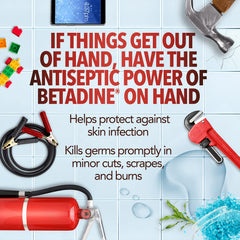 Betadine antiseptic wound application on skin for germ protection.