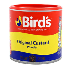 Bird's Custard Powder pouring into a cup for smooth custard.