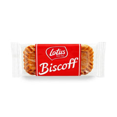 Plate with coffee pairing suggests enjoying Biscoff with a warm drink at home.