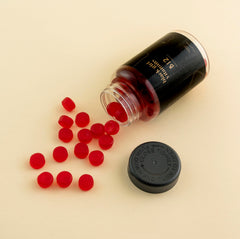Close-up of Black Girl Vitamins B12 Gummies highlighting energy support.