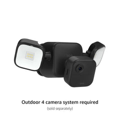 Blink Outdoor Floodlight Mount's motion-activated LED lights illuminate driveways at night.