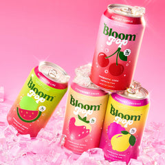 Bloom Pop bottle pour captures crisp, sparkling prebiotic soda in action
