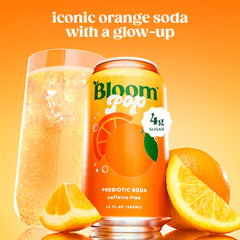 Serving Bloom Pop orange in a glass shows bubbly, caffeine-free delight.