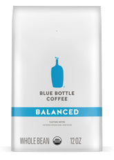 Blue Bottle Balanced coffee bag—12 oz packaging highlighting premium organic beans for home brewing.