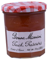 Bonne Maman Peach Preserve jar on a rustic surface, vivid peach flavor, ideal for toast.