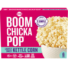 Angie's BOOMCHICKAPOP Lightly Sweet Kettle Corn box on a shelf for quick snacking.