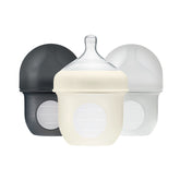 Boon Nursh bottle pouch that collapses during feeding for gas-free drinking.