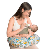 Boppy Nursing Pillow in firm ergonomic U-shape supports comfortable feeding.