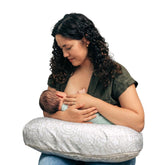 Boppy Nursing Pillow with a firm ergonomic U-shape for comfortable feeding.