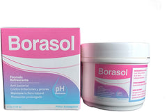 Borasol powder being applied to external vaginal area for cleansing.