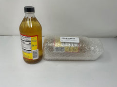 Bragg Apple Cider Vinegar bottle highlighting natural flavoring
