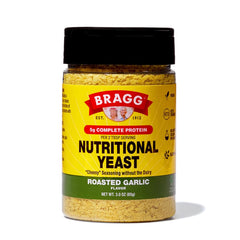 Bragg Nutritional Yeast Roasted Garlic Seasoning bottle adds dairy-free cheesy flavor.