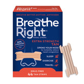 Breathe Right Extra Strength nasal strip on nose improves airflow.