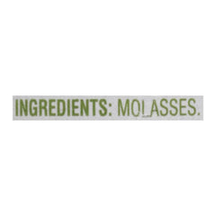 Brer Rabbit molasses pouring on spoon highlighting thick texture for recipes